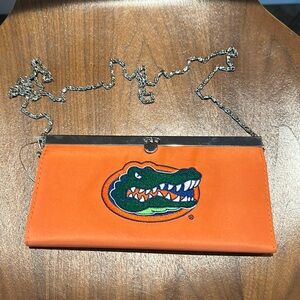 UF  Gators Clutch🧡💙 come with shoulder strap nwot 9 x 4”